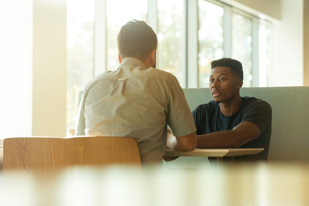 Two men chatting